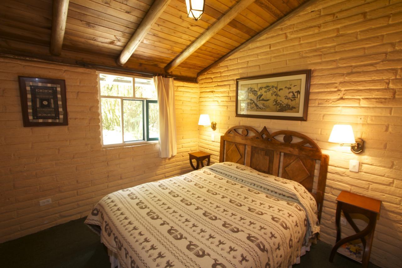 Las Palmeras Inn Otavalo Habitación foto